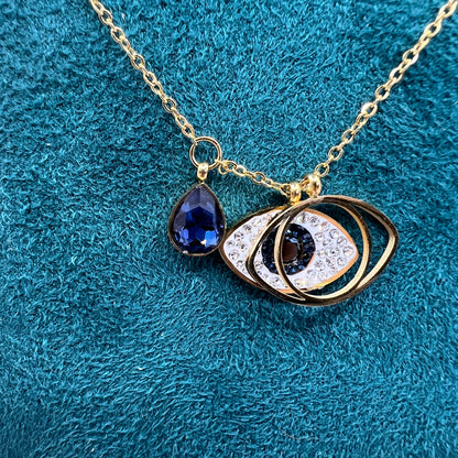 Evil eye blue stone gold necklace