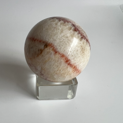 Orange banded calcite sphere